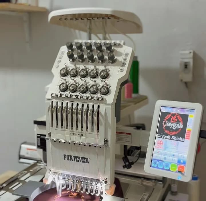 Elgabaku sexində çoxbaşlı toxuma maşını